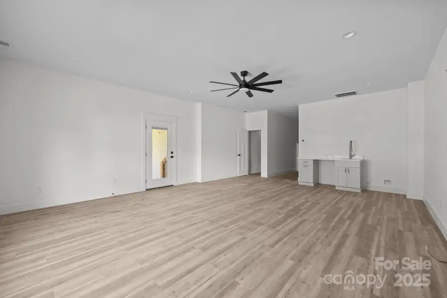 Lower level with wet bar Lower level with wet bar