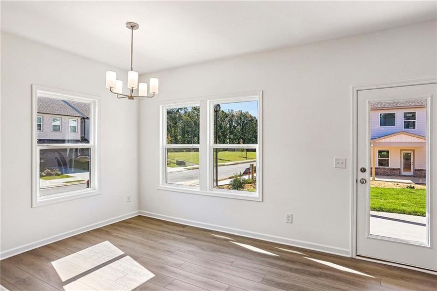 Spacious, unfurnished interior of a new home in Eastlyn Crossing, Flowery Branch (Image 16).
