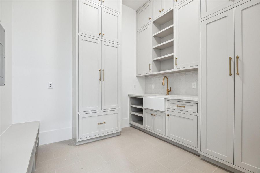 Mudroom off the garage with ample amount of storage.