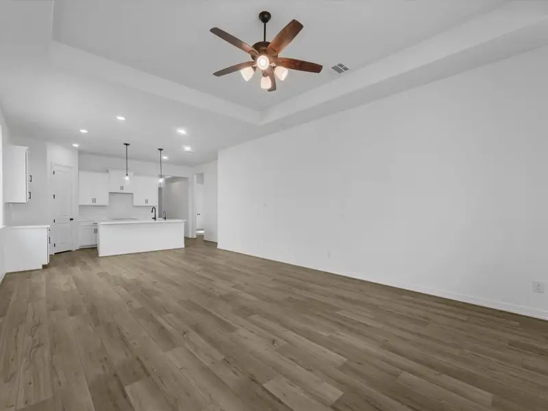 Gathering room. Sample product photo. Actual exterior and interior selections may vary by homesite. Photo may be virtually staged.