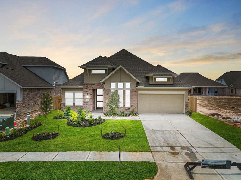 Front exterior of a new home in The Meadows at Imperial Oaks 60', Conroe, TX, highlighting curb appeal (Image 22). Front exterior of a new home in The Meadows at Imperial Oaks 60', Conroe, TX, highlighting curb appeal (Image 22).
