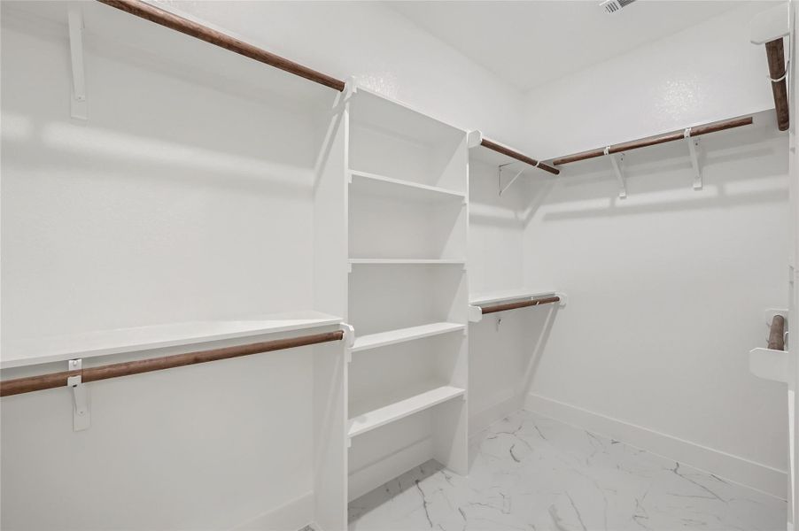 Primary Bedroom Walk in closet