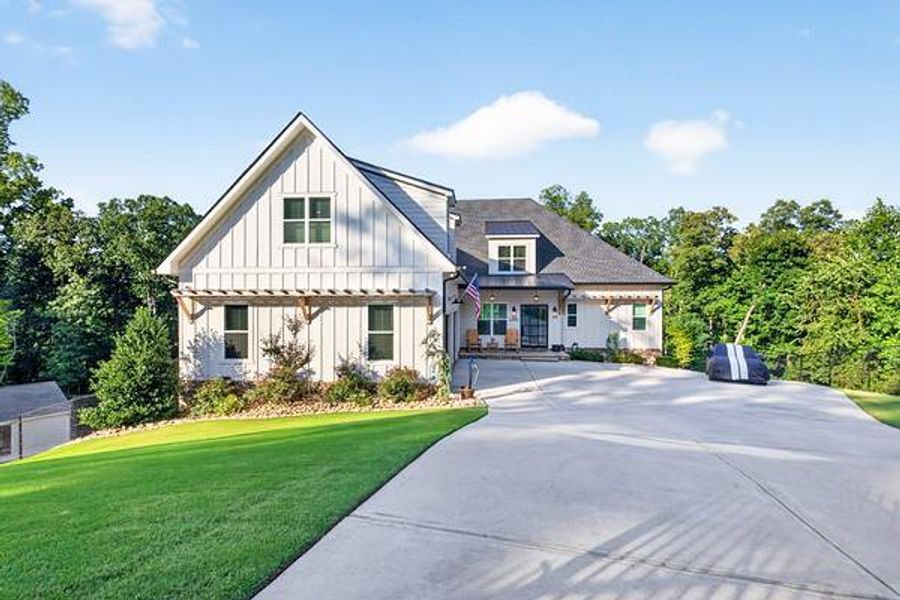 Front exterior of a new home in , Gainesville, GA, highlighting curb appeal (Image 28). Front exterior of a new home in , Gainesville, GA, highlighting curb appeal (Image 28).