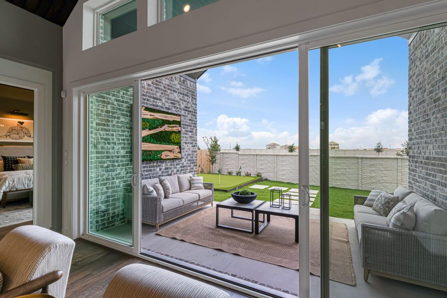 Exterior details and patio area of a home in Lariat, Liberty Hill (Image 36).