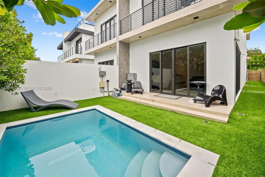 Exterior details and patio area of a home in , Miami (Image 3).