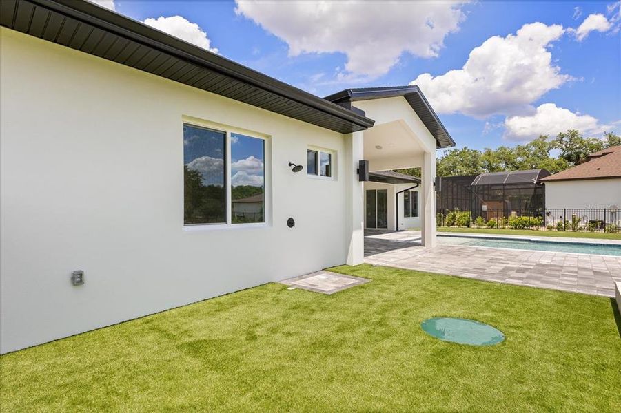Exterior details and patio area of a home in , Sanford (Image 37).