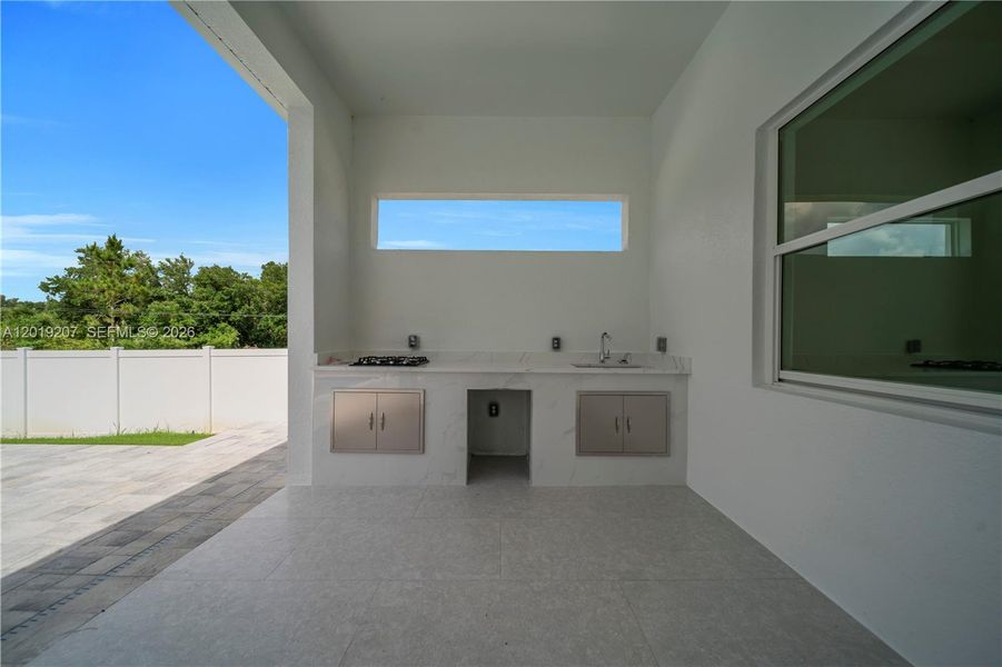 Exterior details and patio area of a home in , Lehigh Acres (Image 30). Exterior details and patio area of a home in , Lehigh Acres (Image 30).