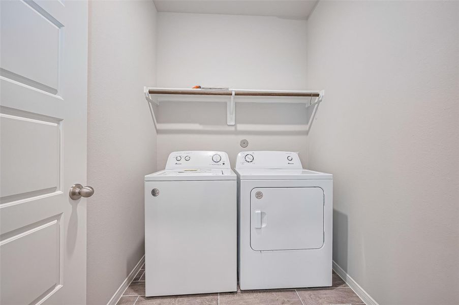 Furnished interior view inside a new home in Sunterra, Katy (Image 16).