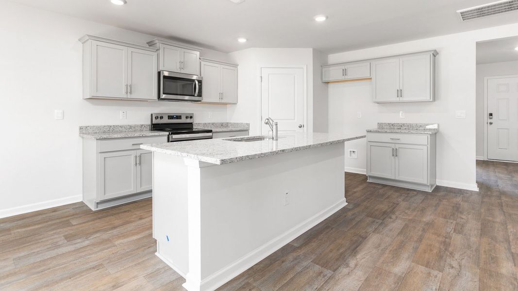 Representative furnished interior of a home built from the Hayden by D.R. Horton in Country Creek, Lexington (Image 6).