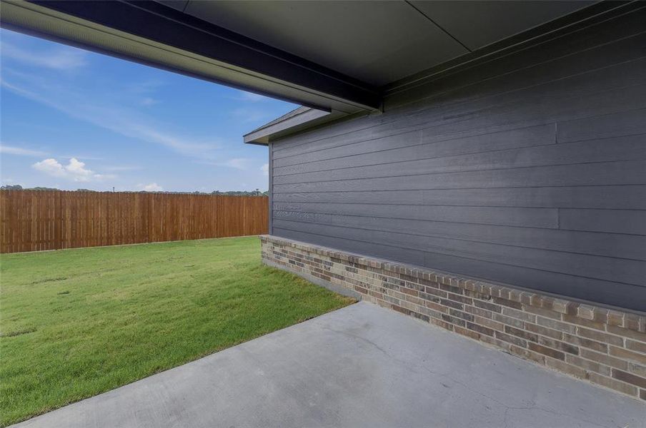 Exterior details and patio area of a home in Covenant Park, Springtown (Image 4). Exterior details and patio area of a home in Covenant Park, Springtown (Image 4).