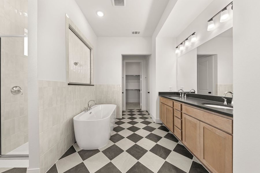 Furnished interior view inside a new home in Lily Creek at Sutton Fields, Aubrey (Image 12).