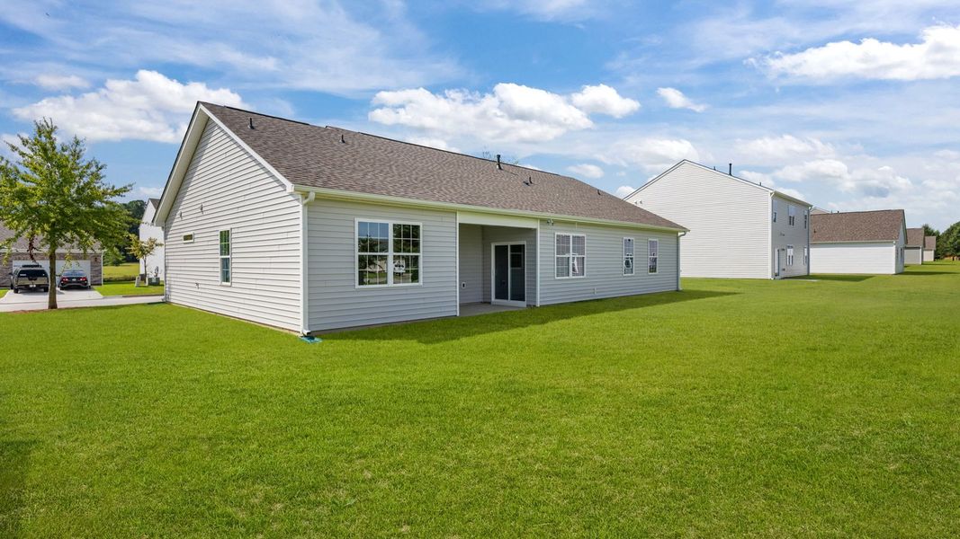 Front exterior of a new home in Tyler - Home on the Lake, New Bern, NC, highlighting curb appeal (Image 17).