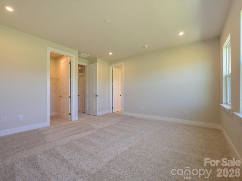 Light filled primary bedroom