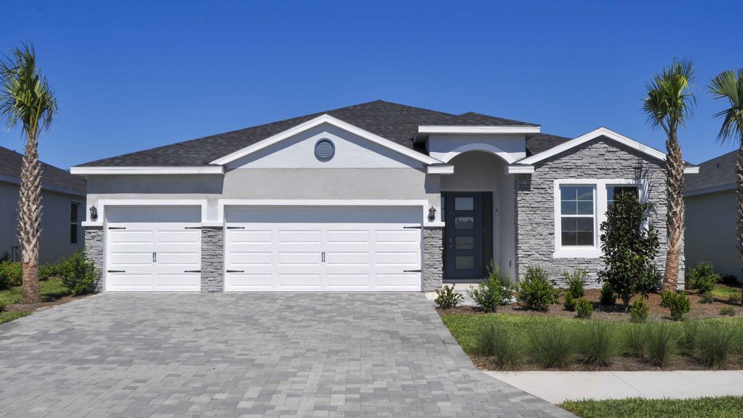 Representative exterior photo of a completed home built from the Destin by D.R. Horton in Legacy Preserve, Parrish, FL (Image 1).