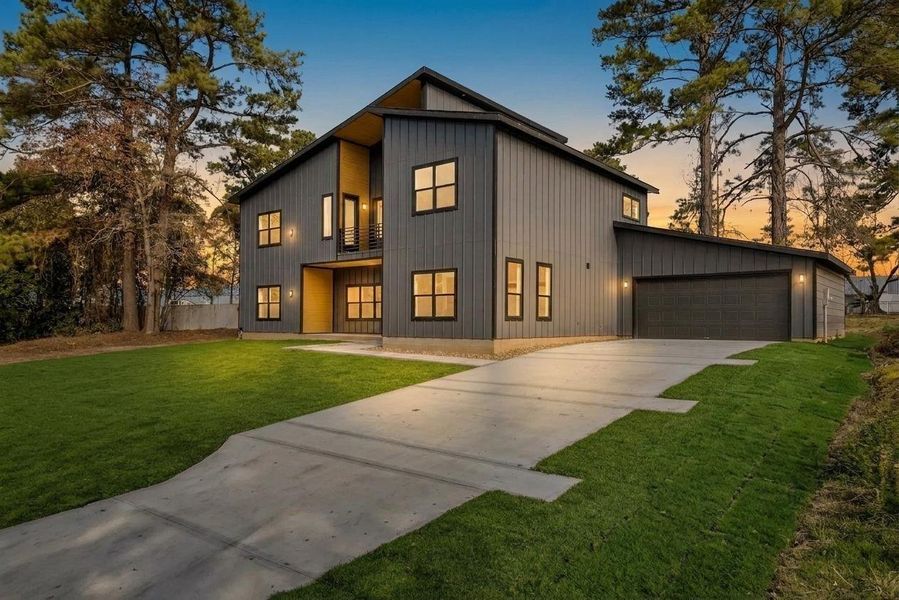 Front exterior of a new home in , Willis, TX, highlighting curb appeal (Image 2).