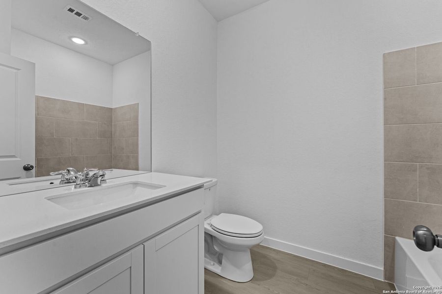 Furnished interior view inside a new home in , New Braunfels (Image 7).