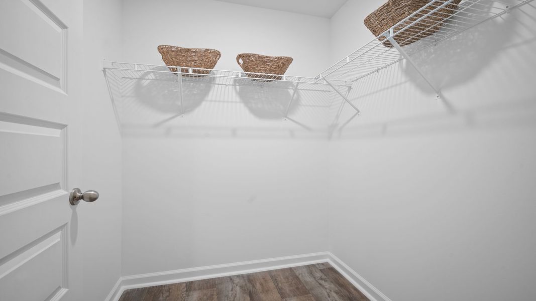 Representative unfurnished interior of a home built from the Freeport by D.R. Horton in Palm Ridge, Guyton (Image 19).