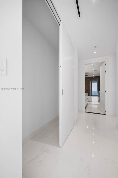 Spacious, unfurnished interior of a new home in Aston Martin Residences, Miami (Image 20).
