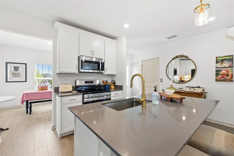 Furnished interior view inside a new home in Wellness Ridge, Clermont (Image 19).
