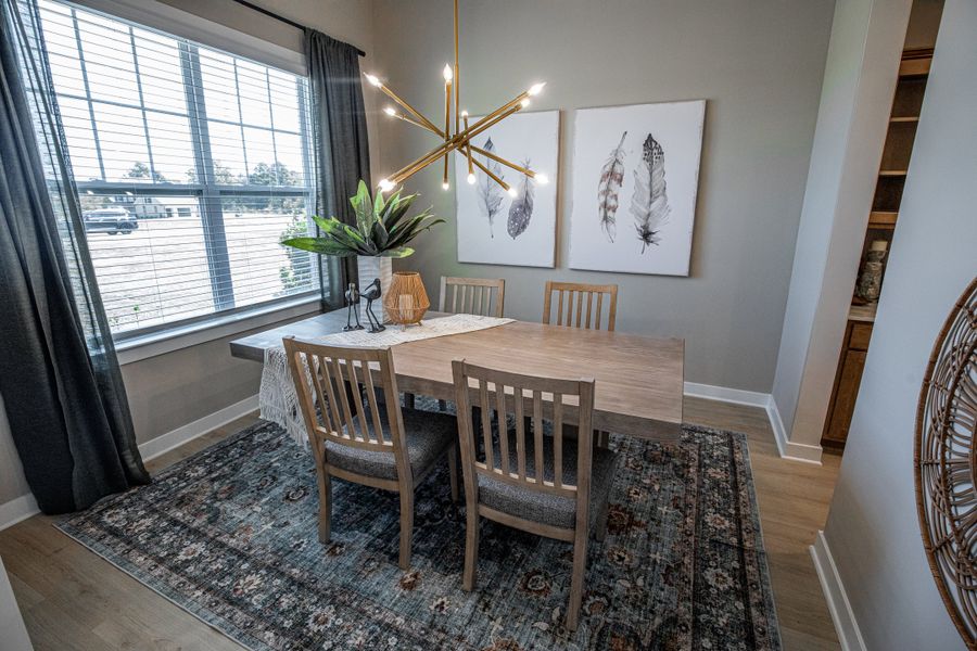 Representative furnished interior of a home built from the Willow by Grant & Co in Manor at Hall Creek, Arlington (Image 102).