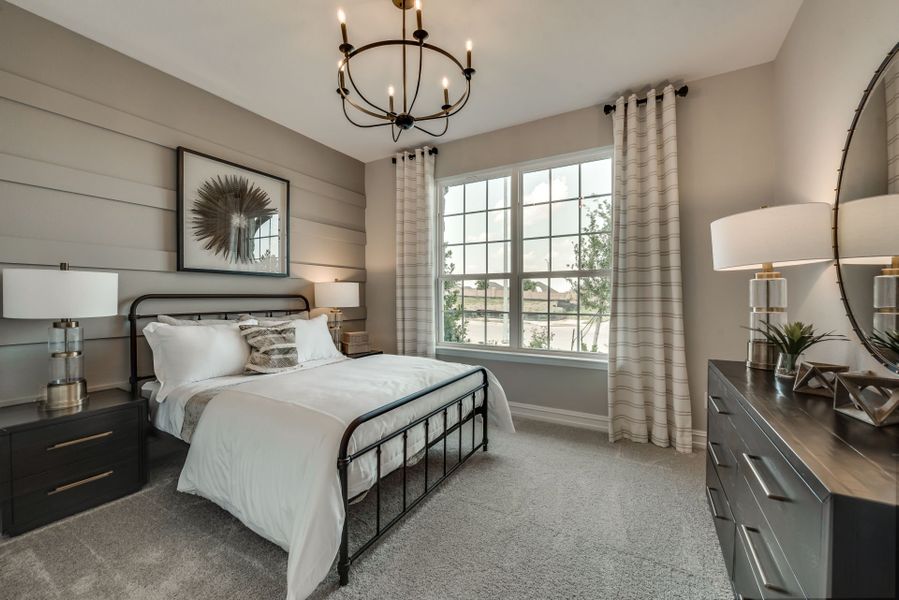 Secondary bedroom with large windows