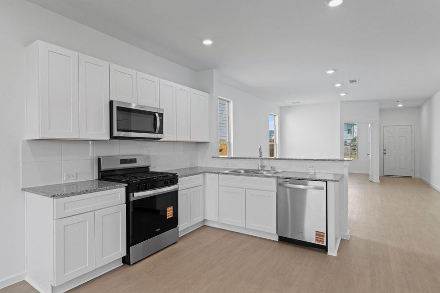Furnished interior view inside a new home in Crosby Farms, Crosby (Image 5).