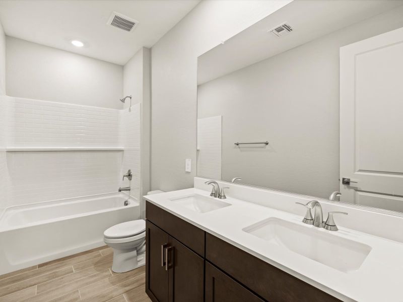 Furnished interior view inside a new home in White Tank Foothills Signature Series, Waddell (Image 8).