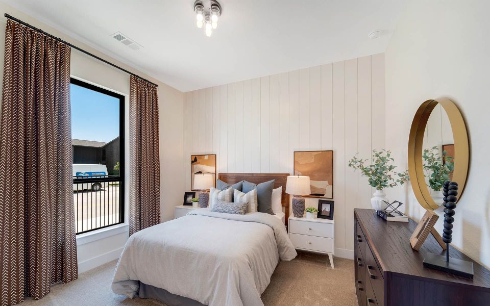 Representative furnished interior of a home built from the Rainier by CastleRock Communities in The Summit at Center Stage, Keller (Image 15).