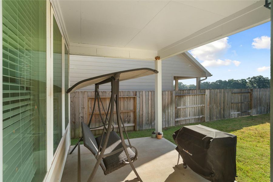 Exterior details and patio area of a home in , Conroe (Image 2). Exterior details and patio area of a home in , Conroe (Image 2).