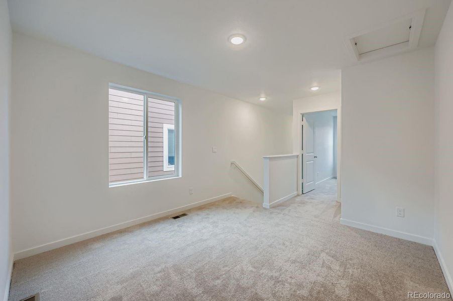 Spacious, unfurnished interior of a new home in Preserve at Mesa Creek: The Celestial Collection, Colorado Springs (Image 11).