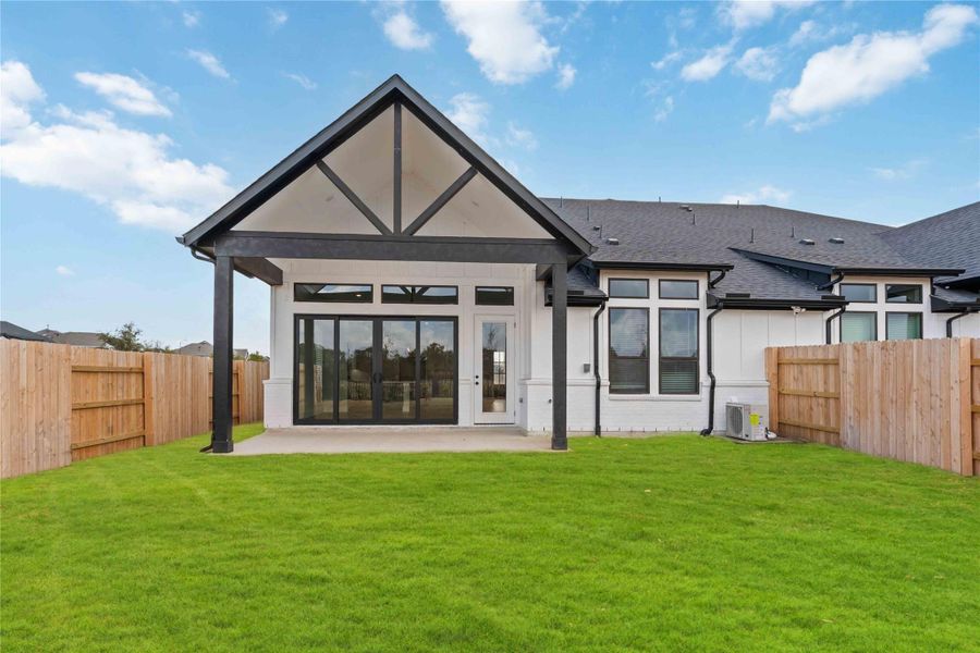 Exterior details and patio area of a home in Elyson, Katy (Image 4). Exterior details and patio area of a home in Elyson, Katy (Image 4).