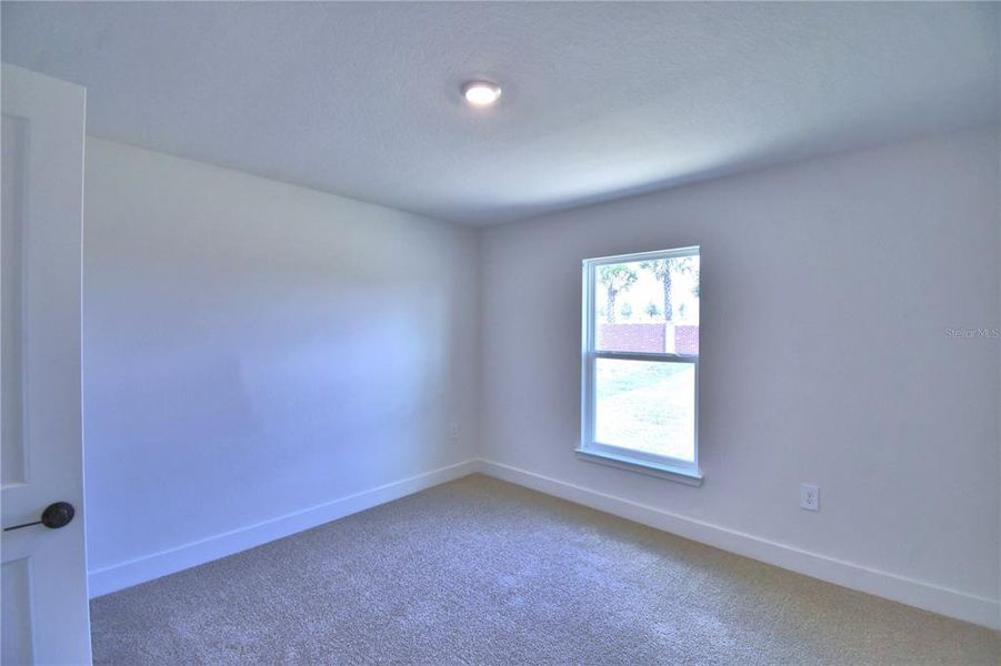 Spacious, unfurnished interior of a new home in Lake Juliana Estates, Auburndale (Image 40).