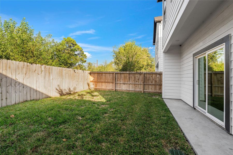 Exterior details and patio area of a home in , Houston (Image 3).