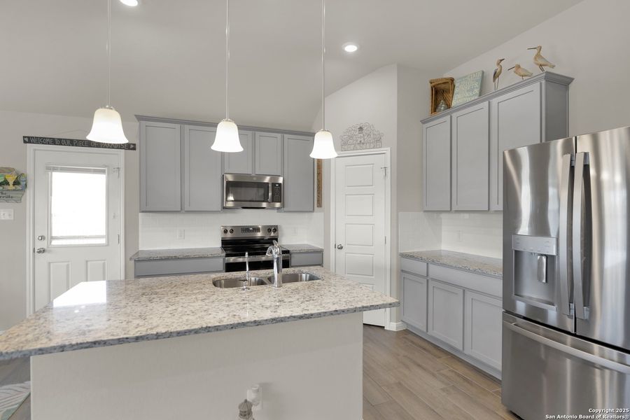Furnished interior view inside a new home in Chaparral Ranch, Floresville (Image 3).