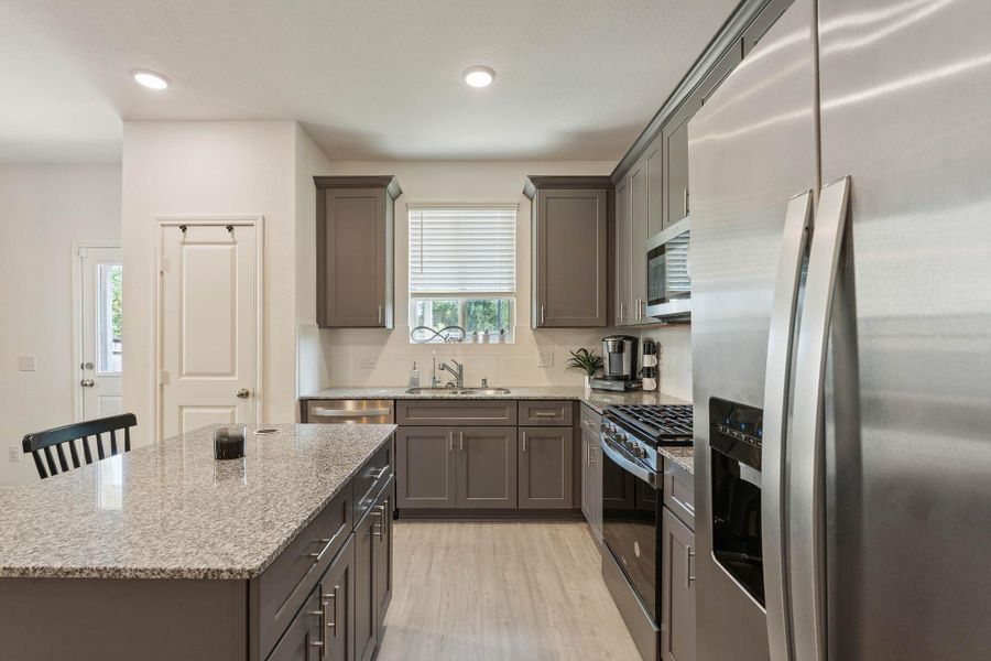 Furnished interior view inside a new home in Myrtle Gardens, Magnolia (Image 23). Furnished interior view inside a new home in Myrtle Gardens, Magnolia (Image 23).