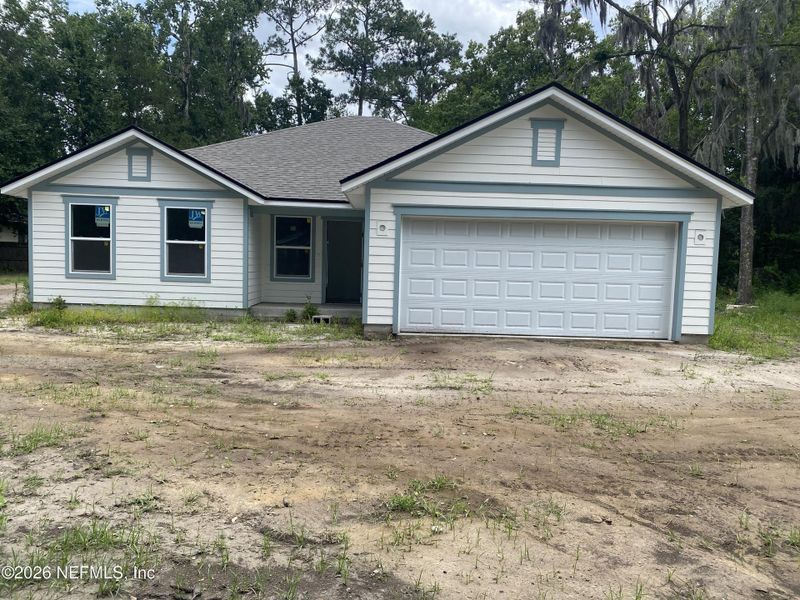 Front exterior of a new home in , Jacksonville, FL, highlighting curb appeal (Image 1). Front exterior of a new home in , Jacksonville, FL, highlighting curb appeal (Image 1).
