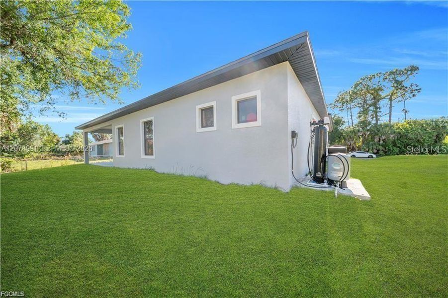 Exterior details and patio area of a home in , North Port (Image 4).