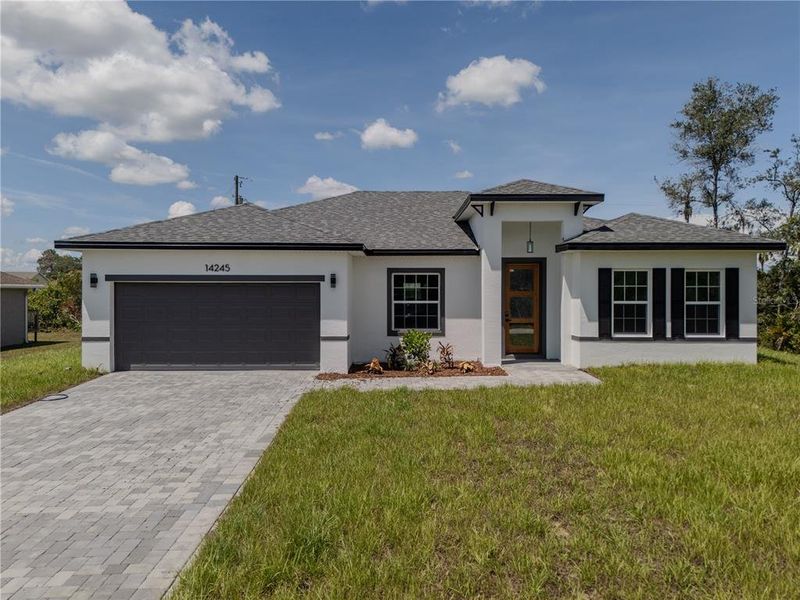 Front exterior of a new home in , Ocala, FL, highlighting curb appeal (Image 33).