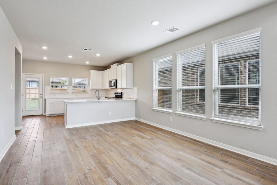 Dining room in the Medina floorplan at a Meritage Homes community.