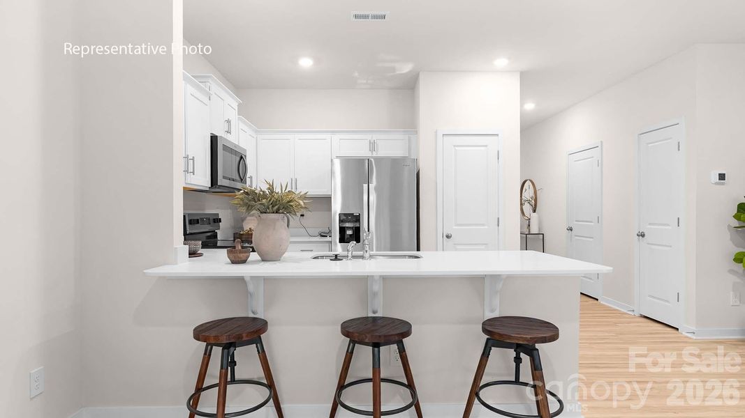 Furnished interior view inside a new home in The Townes at Troutman, Troutman (Image 10).