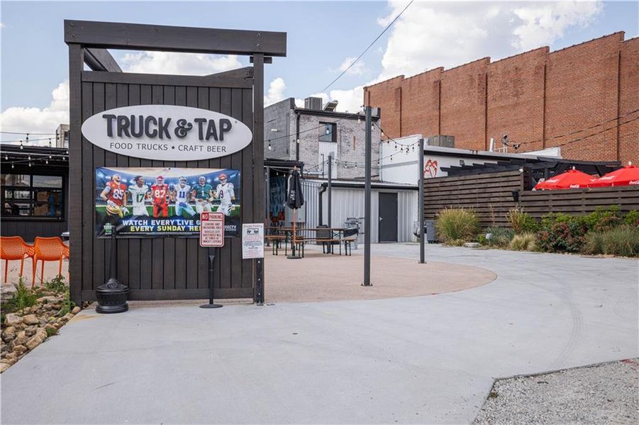 Front exterior of a new home in Rhodes Glen, Lawrenceville, GA, highlighting curb appeal (Image 2).