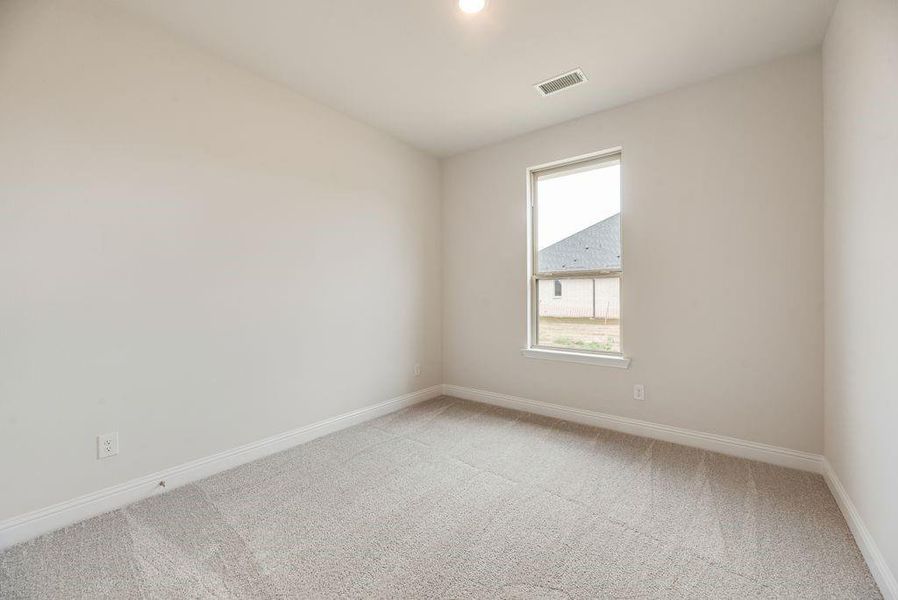 Spacious, unfurnished interior of a new home in Spiritas Ranch, Little Elm (Image 24).