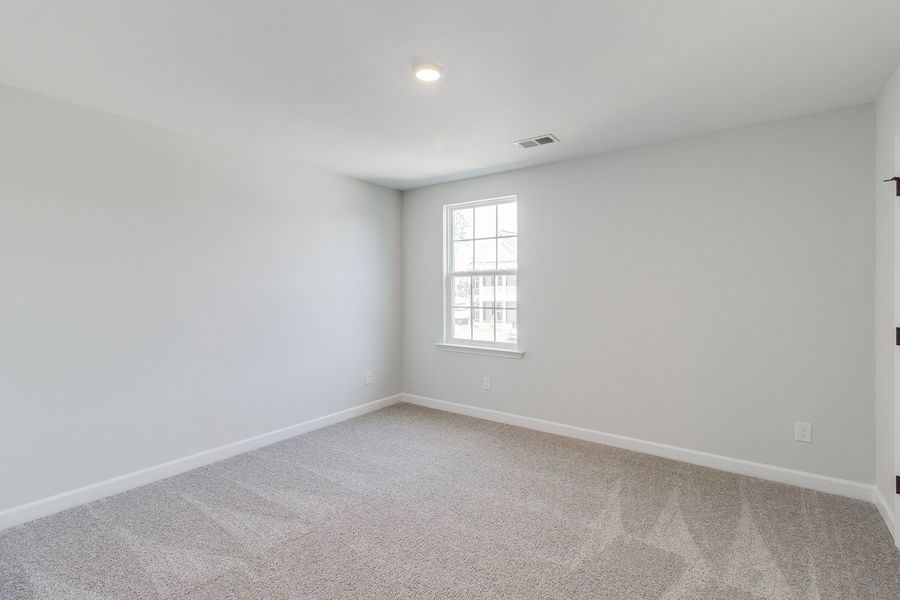 Spacious, unfurnished interior of a new home in Pebble Branch, Chapin (Image 39).