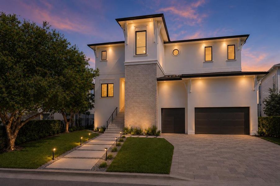 Front exterior of a new home in , Tampa, FL, highlighting curb appeal (Image 18). Front exterior of a new home in , Tampa, FL, highlighting curb appeal (Image 18).