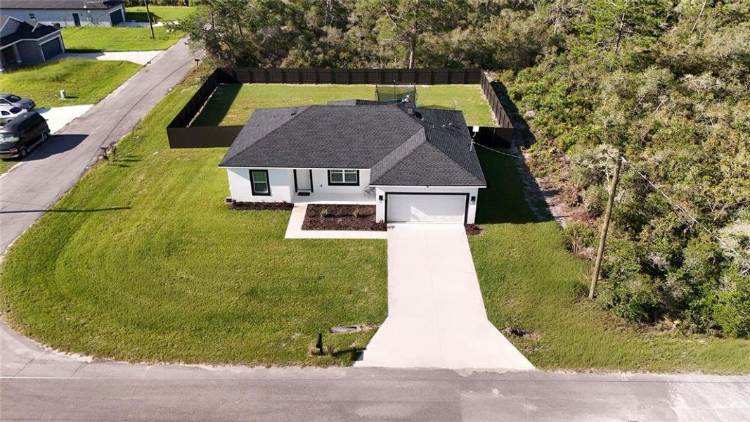 Front exterior of a new home in , Ocklawaha, FL, highlighting curb appeal (Image 2).