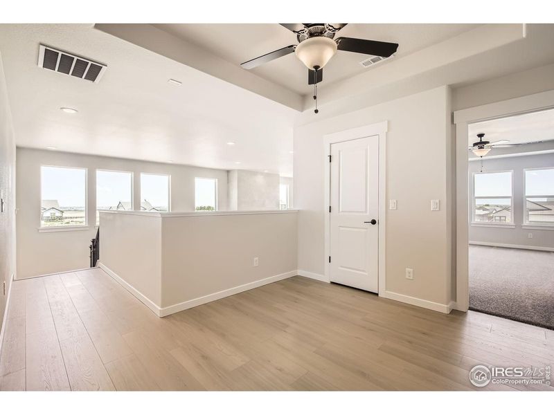 Spacious, unfurnished interior of a new home in RainDance, Windsor (Image 16).