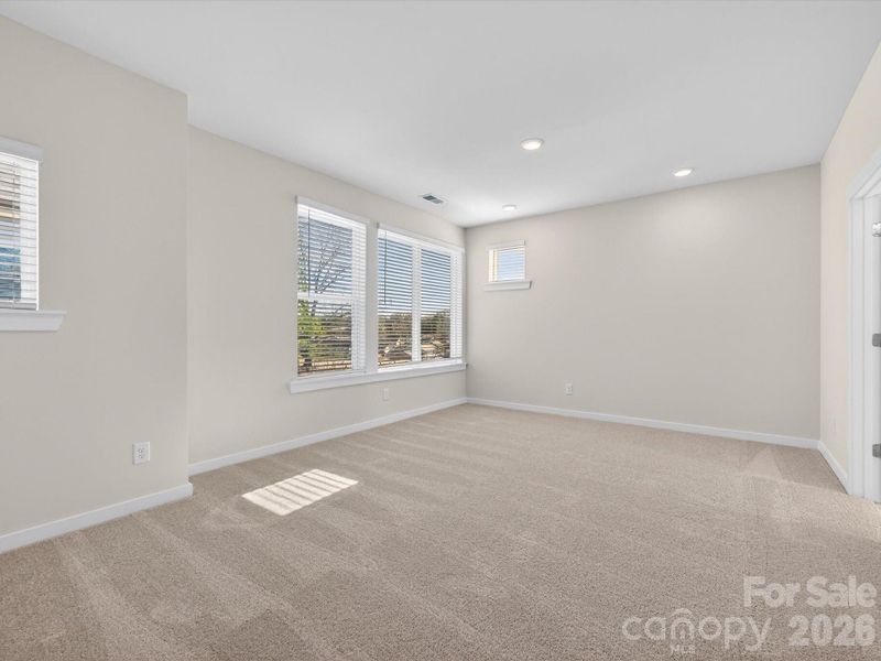 Spacious, unfurnished interior of a new home in Central Living at Craig, Charlotte (Image 25).