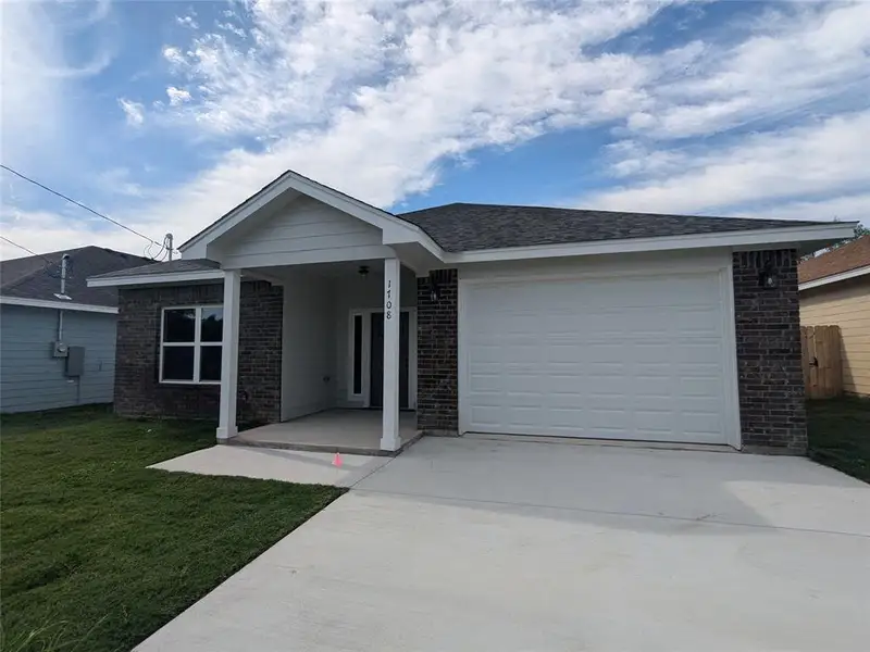 Front exterior of a new home in , Lampasas, TX, highlighting curb appeal (Image 9). Front exterior of a new home in , Lampasas, TX, highlighting curb appeal (Image 9).