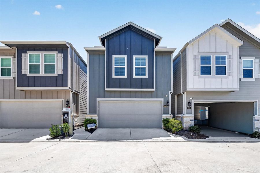 Front exterior of a new home in Park Row Village, Houston, TX, highlighting curb appeal (Image 2). Front exterior of a new home in Park Row Village, Houston, TX, highlighting curb appeal (Image 2).