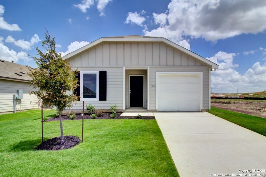 Front exterior of a new home in Prairie Green, Converse, TX, highlighting curb appeal (Image 1). Front exterior of a new home in Prairie Green, Converse, TX, highlighting curb appeal (Image 1).